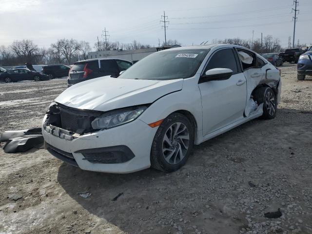 HONDA CIVIC EX 2018 with VIN 19XFC2F71JE010966 - Photo from auction