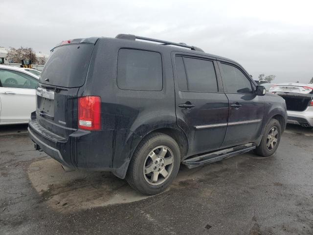 Photo 3 from auction – 2011 HONDA PILOT TOUR with VIN 5FNYF3H97BB057516