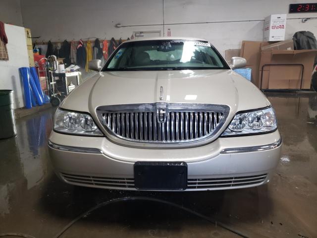 Photo 5 from auction – 2004 LINCOLN TOWN CAR E with VIN 1LNHM81W64Y684970