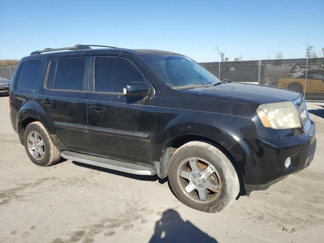 Photo 4 from auction – 2010 HONDA PILOT TOUR with VIN 5FNYF3H82AB008505