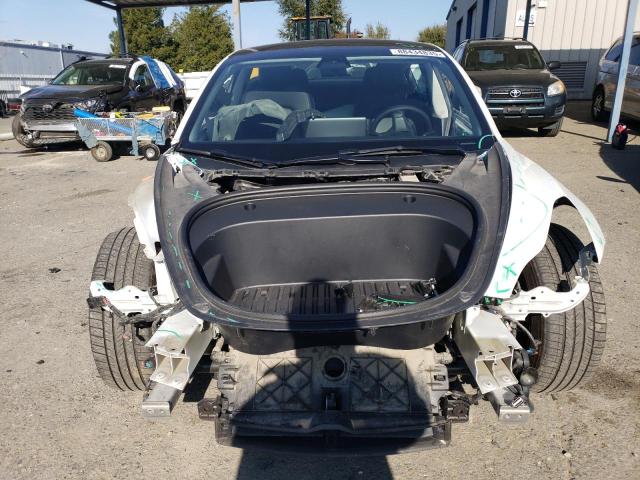 Photo 5 from auction – 2022 TESLA MODEL 3 with VIN 5YJ3E1EB5NF131643