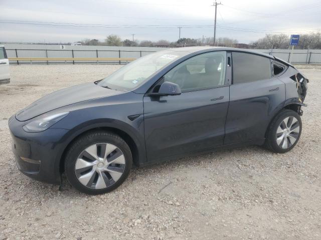 TESLA MODEL Y 2024 with VIN 7SAYGDEE1RA235662 - Photo from auction