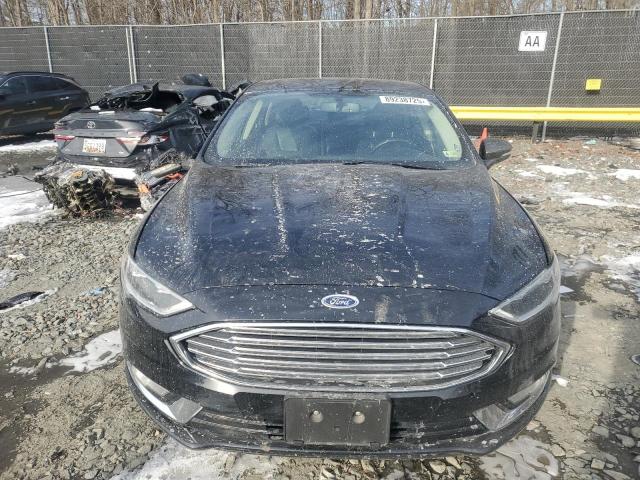 Photo 5 from auction – 2018 FORD FUSION TIT with VIN 3FA6P0D90JR124131