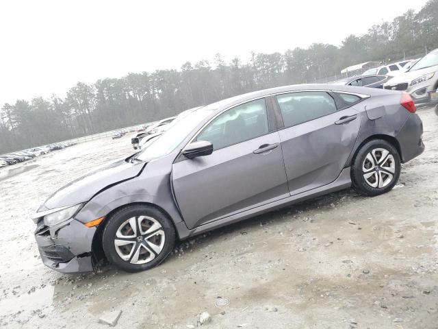 Photo 1 from auction – 2018 HONDA CIVIC LX with VIN 19XFC2F50JE037462