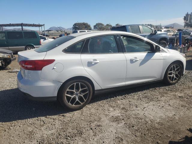 Photo 3 from auction – 2017 FORD FOCUS SE with VIN 1FADP3FE7HL253981