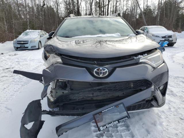 Photo 5 from auction – 2018 TOYOTA RAV4 SE with VIN 2T3JFREV0JW699106