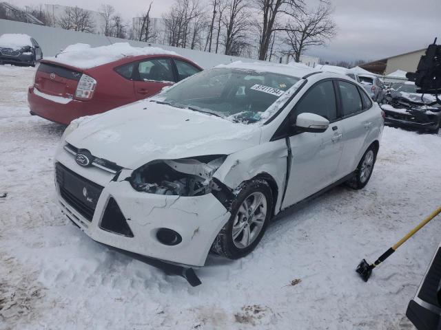 FORD FOCUS SE 2014 with VIN 1FADP3F28EL319763 - Photo from auction