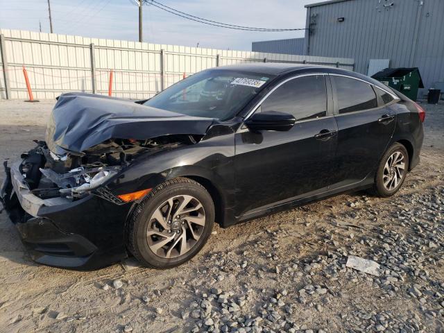 Photo 1 from auction – 2018 HONDA CIVIC EX with VIN 19XFC2F75JE030119
