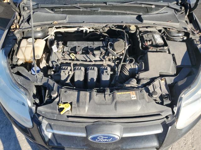 Photo 11 from auction – 2013 FORD FOCUS SE with VIN 1FADP3F20DL340105