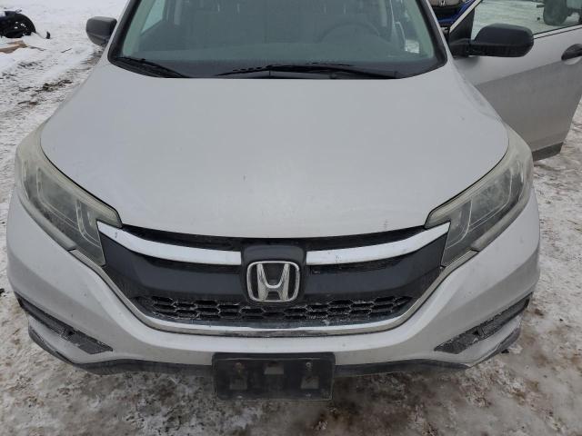 Photo 12 from auction – 2015 HONDA CR-V LX with VIN 5J6RM4H39FL023084