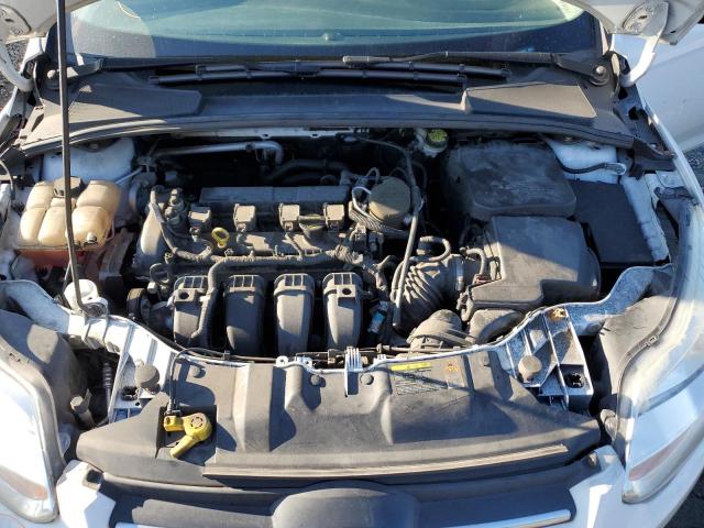 Photo 11 from auction – 2014 FORD FOCUS S with VIN 1FADP3E2XEL200050