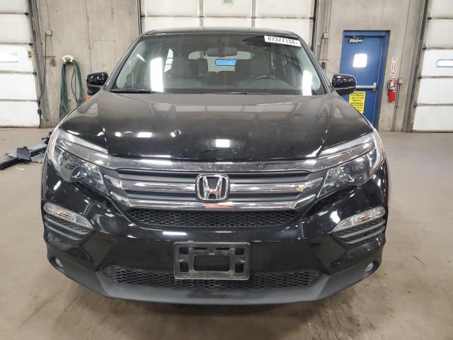 Photo 5 from auction – 2016 HONDA PILOT EXL with VIN 5FNYF6H57GB014591