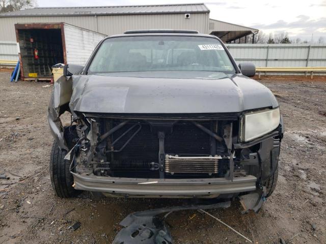 Photo 5 from auction – 2011 HONDA RIDGELINE with VIN 5FPYK1F5XBB010715