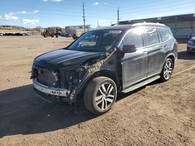 HONDA PILOT ELIT 2016 with VIN 5FNYF6H07GB103579 - Photo from auction