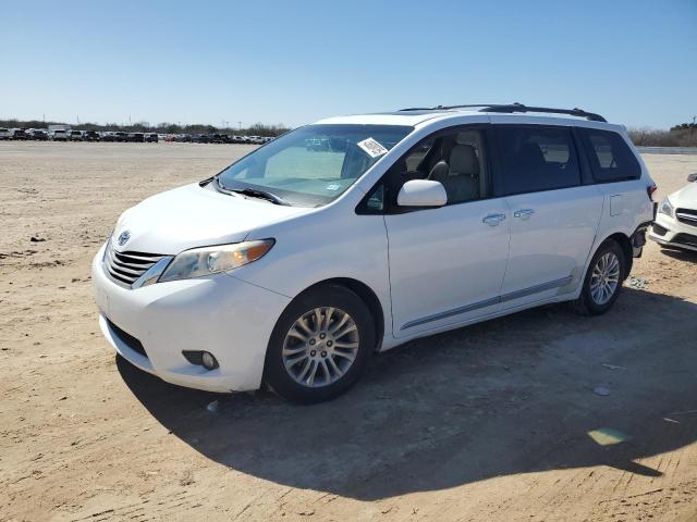 TOYOTA SIENNA XLE 2011 with VIN 5TDYK3DC7BS052454 - Photo from auction