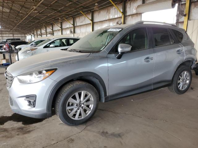 MAZDA CX-5 TOURI 2016 with VIN JM3KE2CY9G0803303 - Photo from auction