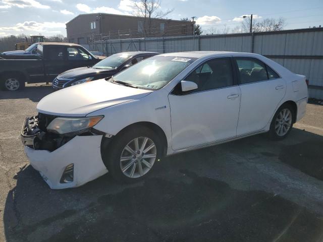 TOYOTA CAMRY HYBR 2013 with VIN 4T1BD1FK2DU091763 - Photo from auction