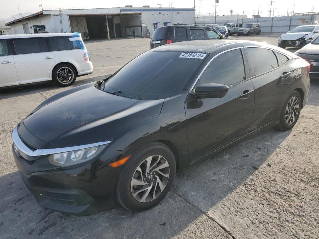 HONDA CIVIC EX 2016 z numerem VIN 2HGFC2F77GH517983 - Zdjęcie z aukcji