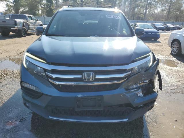 Photo 5 from auction – 2017 HONDA PILOT TOUR with VIN 5FNYF6H96HB041320