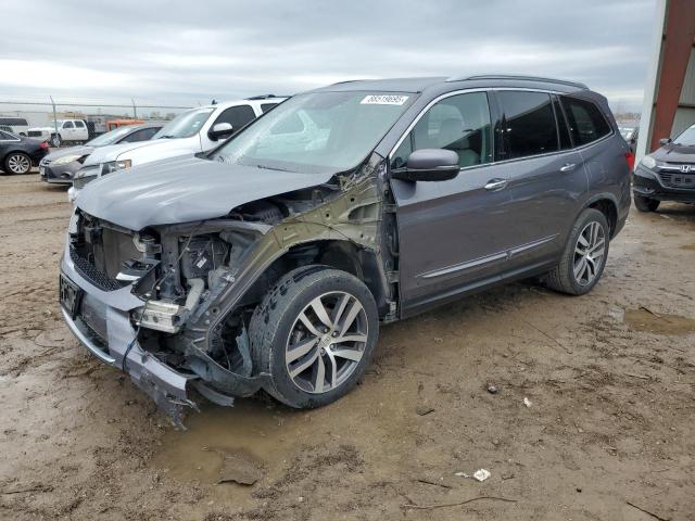 HONDA PILOT ELIT 2016 with VIN 5FNYF6H02GB111640 - Photo from auction