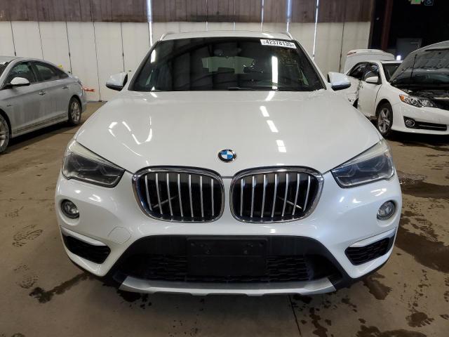 Photo 5 from auction – 2016 BMW X1 XDRIVE2 with VIN WBXHT3C34G5E55485