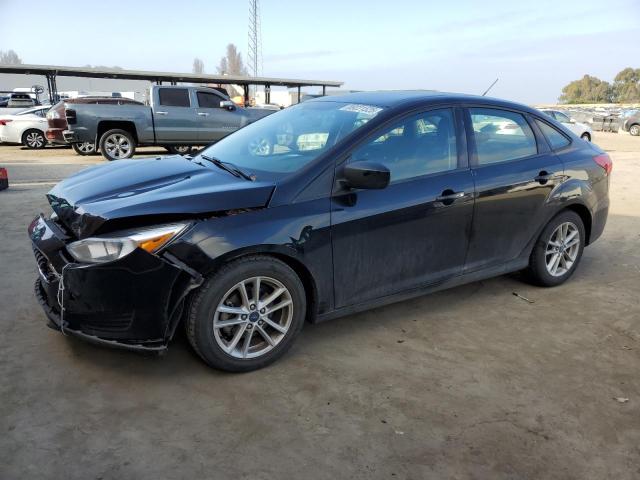 FORD FOCUS SE 2018 with VIN 1FADP3F23JL324105 - Photo from auction