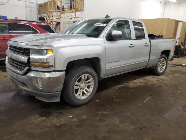 CHEVROLET SILVERADO 2018 with VIN 1GCVKREC7JZ110256 - Photo from auction