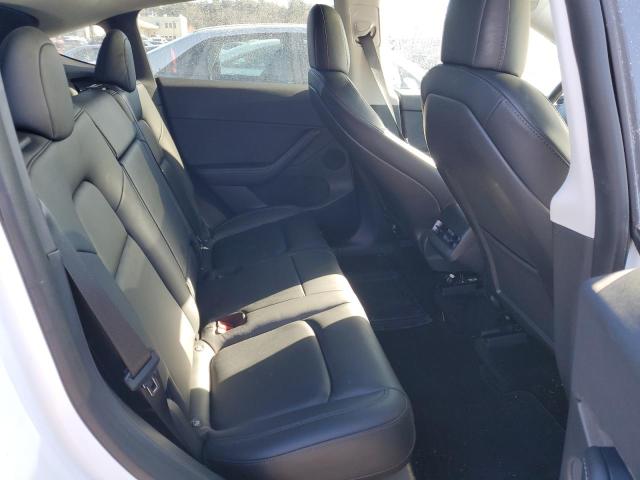 Photo 11 from auction – 2022 TESLA MODEL Y with VIN 7SAYGDEE7NF307980