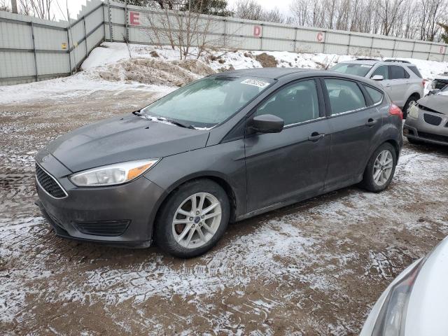 FORD FOCUS SE 2018 with VIN 1FADP3K24JL302040 - Photo from auction