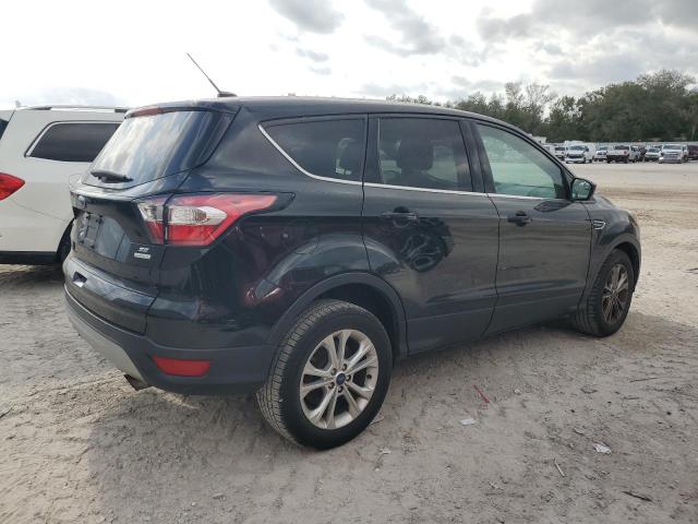 Photo 3 from auction – 2017 FORD ESCAPE SE with VIN 1FMCU0GD1HUD25377