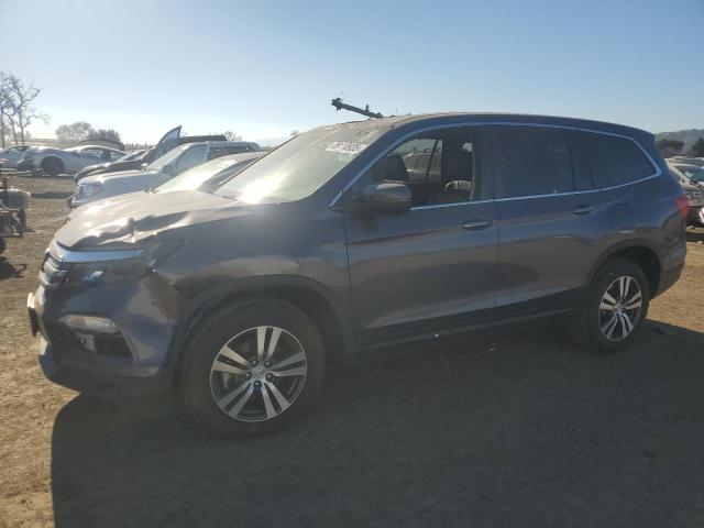 HONDA PILOT EXL 2018 with VIN 5FNYF5H56JB010923 - Photo from auction