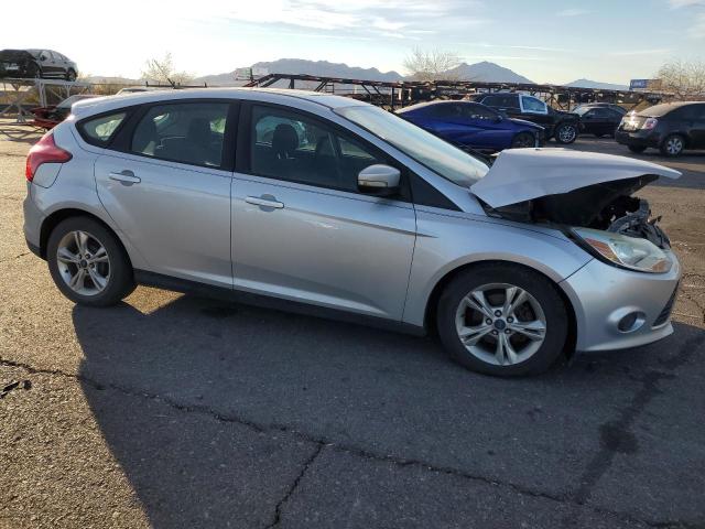 Foto 4 de la subasta – 2014 FORD FOCUS SE con VIN 1FADP3K23EL265102