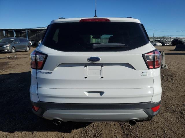 Photo 6 from auction – 2018 FORD ESCAPE SE with VIN 1FMCU9GD0JUB74378