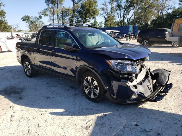 Photo 4 from auction – 2017 HONDA RIDGELINE with VIN 5FPYK3F64HB018290