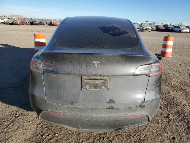 Photo 6 from auction – 2022 TESLA MODEL Y with VIN 7SAYGAEE2NF328699