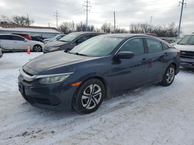 HONDA CIVIC LX 2018 with VIN 2HGFC2F57JH504429 - Photo from auction