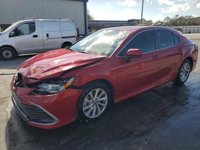 TOYOTA CAMRY LE 2023 with VIN 4T1C11AK2PU112796 - Photo from auction