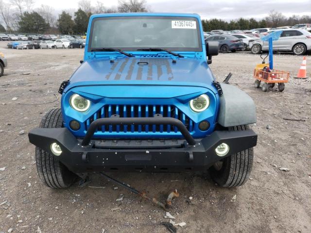 Photo 5 from auction – 2016 JEEP WRANGLER U with VIN 1C4BJWDG9GL104088