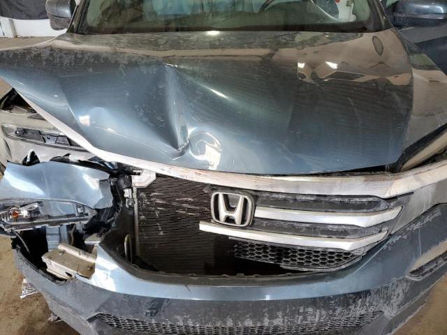 Photo 12 from auction – 2018 HONDA PILOT EXLN with VIN 5FNYF5H79JB019942