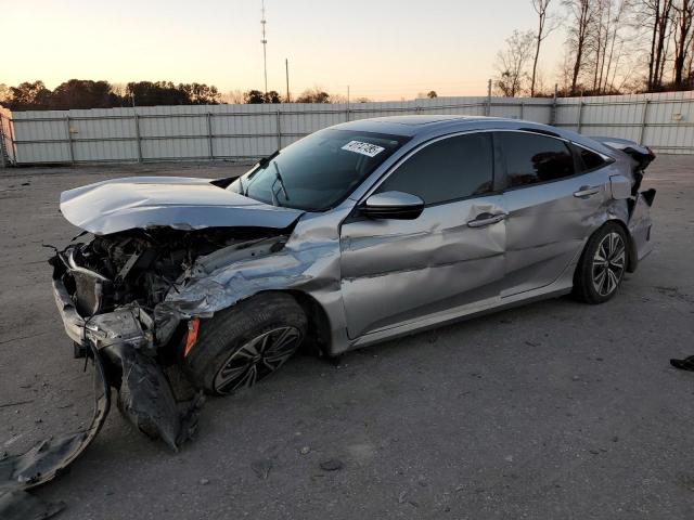 HONDA CIVIC EX 2017 with VIN 2HGFC1F38HH634352 - Photo from auction