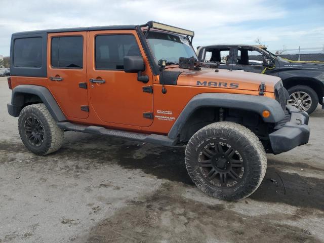 Photo 4 from auction – 2011 JEEP WRANGLER U with VIN 1J4BA3H10BL629659