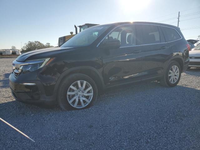 HONDA PILOT LX 2021 with VIN 5FNYF5H10MB007209 - Photo from auction