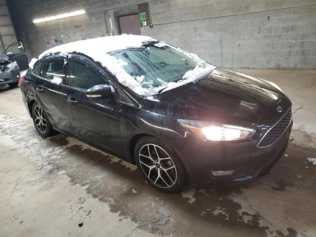 Photo 4 from auction – 2017 FORD FOCUS SEL with VIN 1FADP3H25HL294886