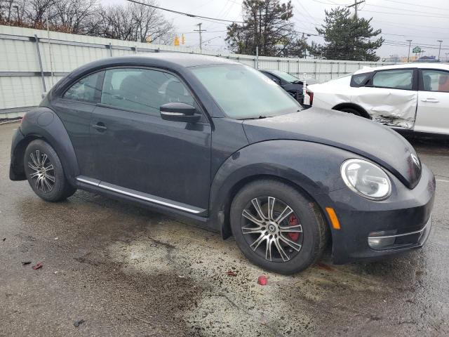 Photo 4 from auction – 2013 VOLKSWAGEN BEETLE TUR with VIN 3VWVA7ATXDM656730