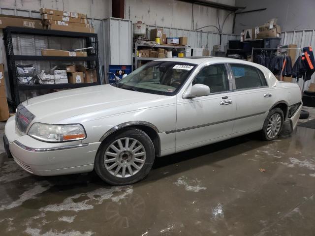LINCOLN TOWN CAR U 2004 with VIN 1LNHM83W04Y649628 - Photo from auction