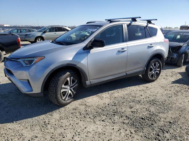 TOYOTA RAV4 LE 2018 with VIN 2T3BFREV1JW758460 - Photo from auction