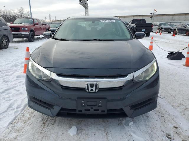 Photo 5 from auction – 2018 HONDA CIVIC LX with VIN 2HGFC2F57JH504429