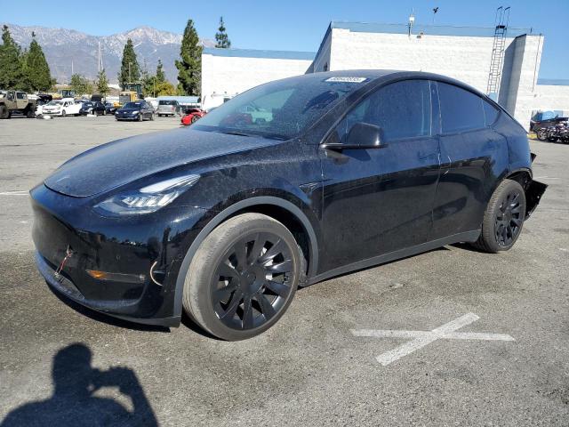 TESLA MODEL Y 2022 with VIN 7SAYGAEE4NF350591 - Photo from auction