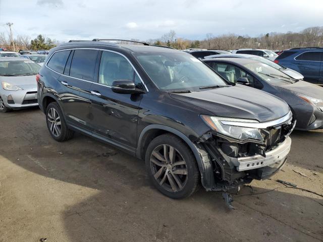 Photo 4 from auction – 2016 HONDA PILOT ELIT with VIN 5FNYF6H09GB056104