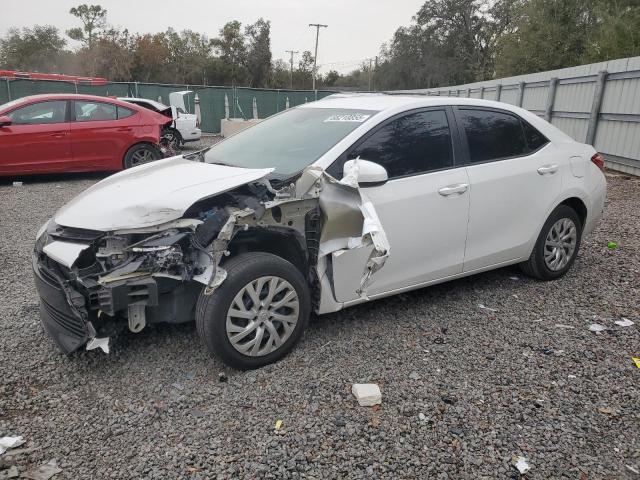 TOYOTA COROLLA L 2018 with VIN 5YFBURHE6JP848988 - Photo from auction